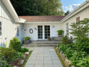 Idyllically Situated Wooden House By The Forest